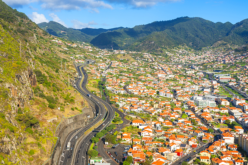 Elevated view of Machico with mountains in background, Madeira, Portugal, Atlantic, Europe