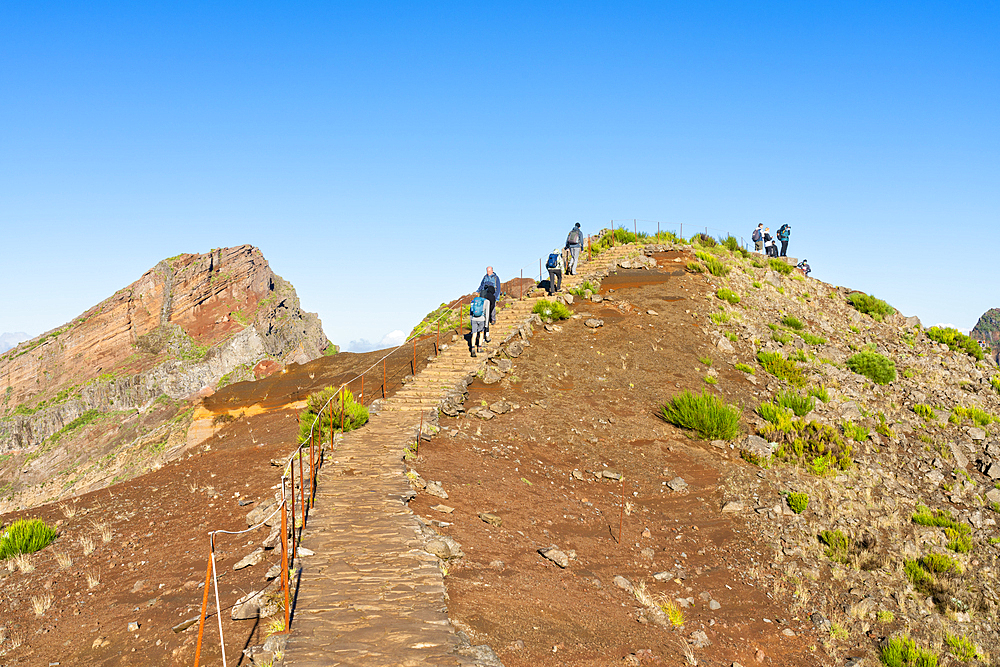 Hikers on hiking trail around Pico do Arieiro peak, Santana, Madeira, Portugal, Atlantic, Europe