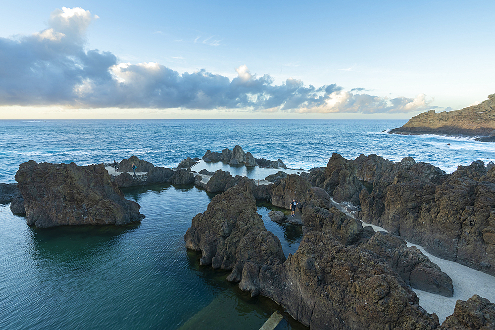 Natural volcanic rock swimming pools at sunset, Porto Moniz, Madeira, Portugal, Atlantic, Europe