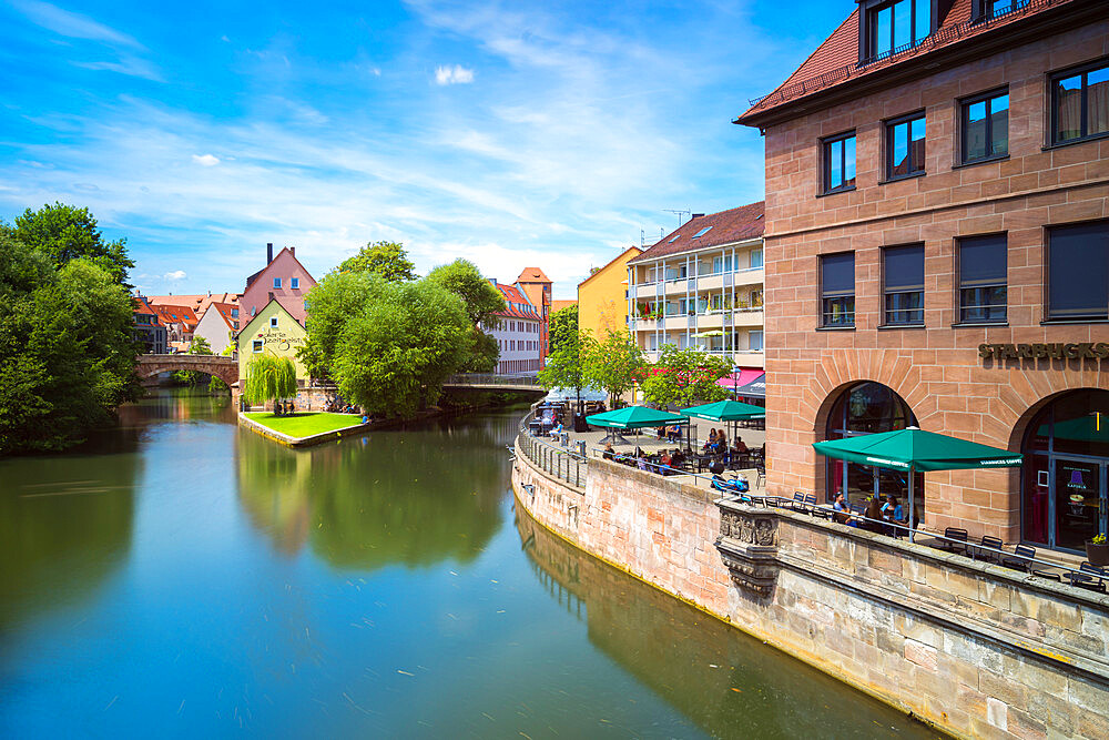 Pegnitz riverside with Trodelmarkt island and Karlsbrucke in distance, Nuremberg, Bavaria, Germany, Europe