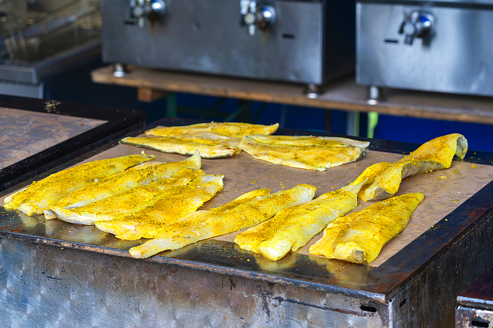 Fish fillets on grill during fish harvest at Rozmberk Pond, UNESCO Biosphere, Trebon, Jindrichuv Hradec District, South Bohemian Region, Czech Republic (Czechia), Europe