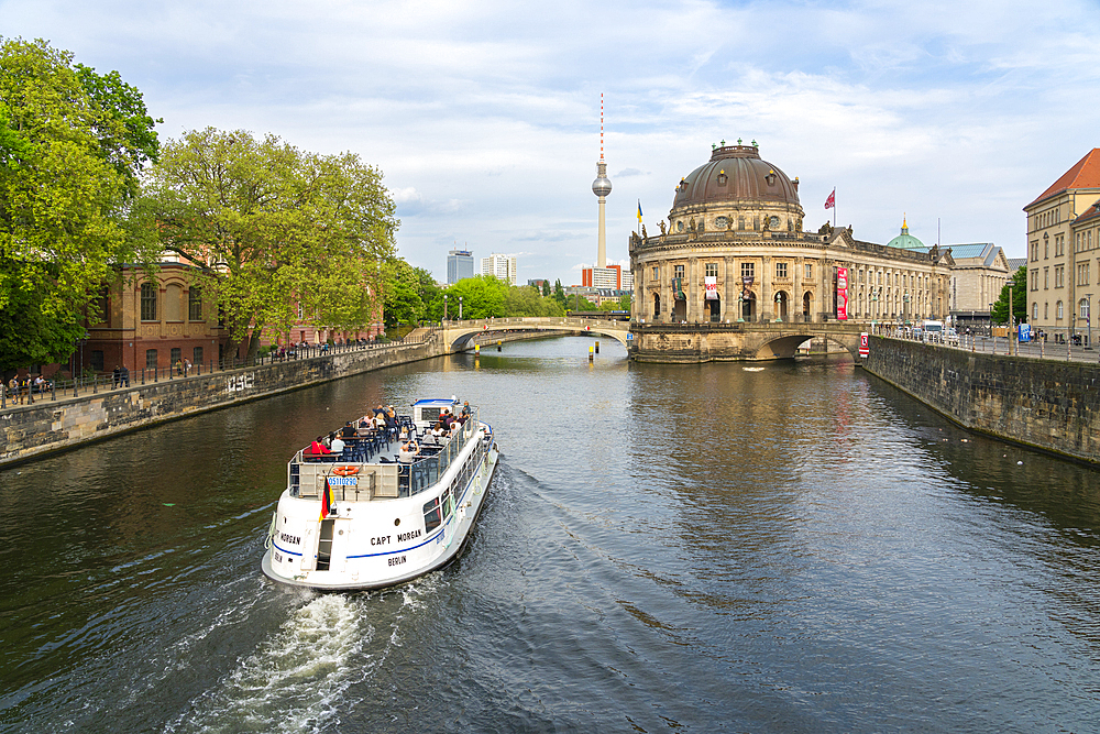 Tourist boat on Spree River heading to Bode Museum and TV Tower, Museum Island, UNESCO World Heritage Site, Berlin, Germany, Europe