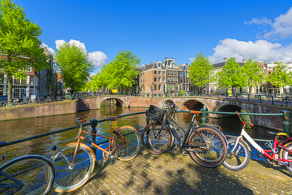 Bicycles by Keizersgracht canal, Amsterdam, The Netherlands, Europe