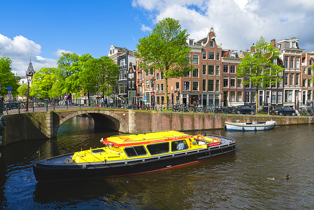 Boat on Prinsengracht canal, Amsterdam, The Netherlands, Europe