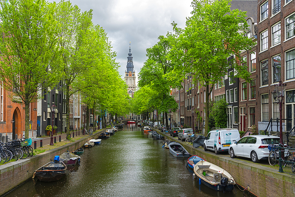 Groenburgwal canal with Zuiderkerk Tower in the background, Amsterdam, The Netherlands, Europe