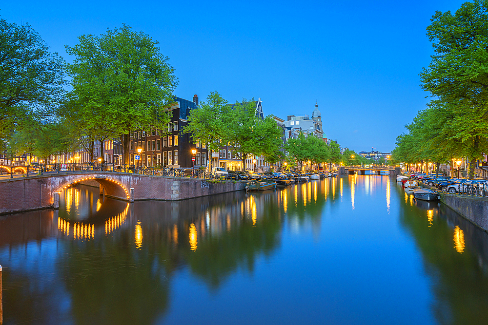 Bridge over Keizergracht canal at twilight, Amsterdam, The Netherlands