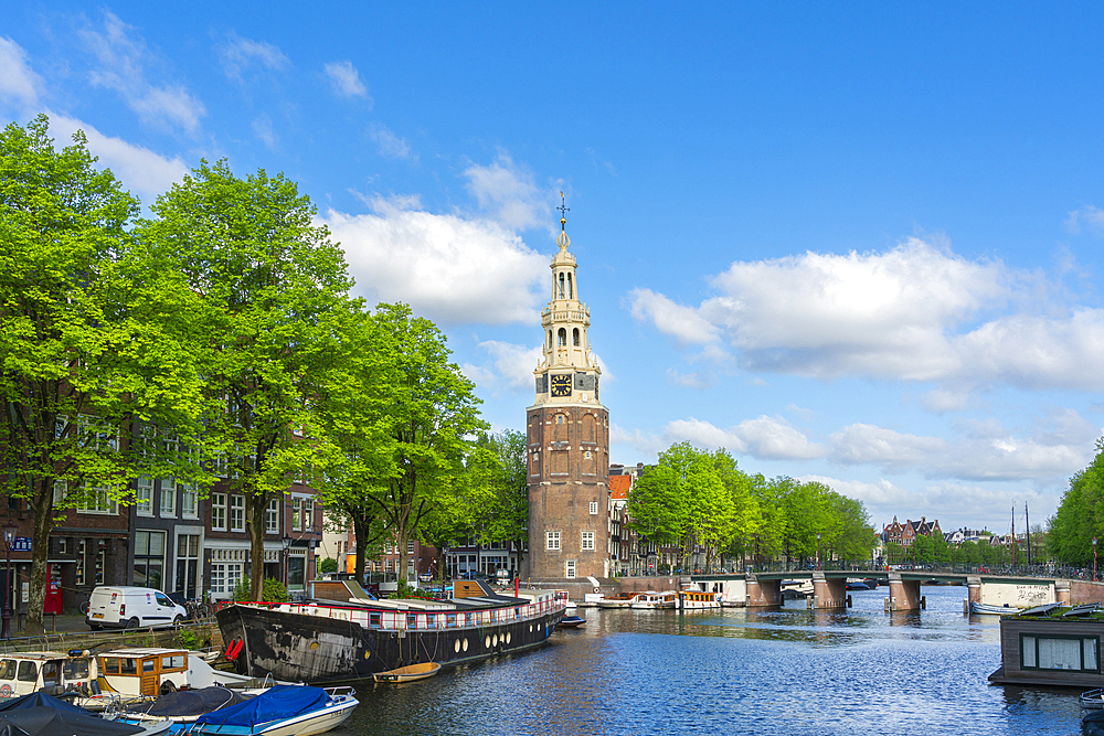 Rapenburgwal canal and Montelbaanstoren tower in background, Amsterdam, The Netherlands, Europe