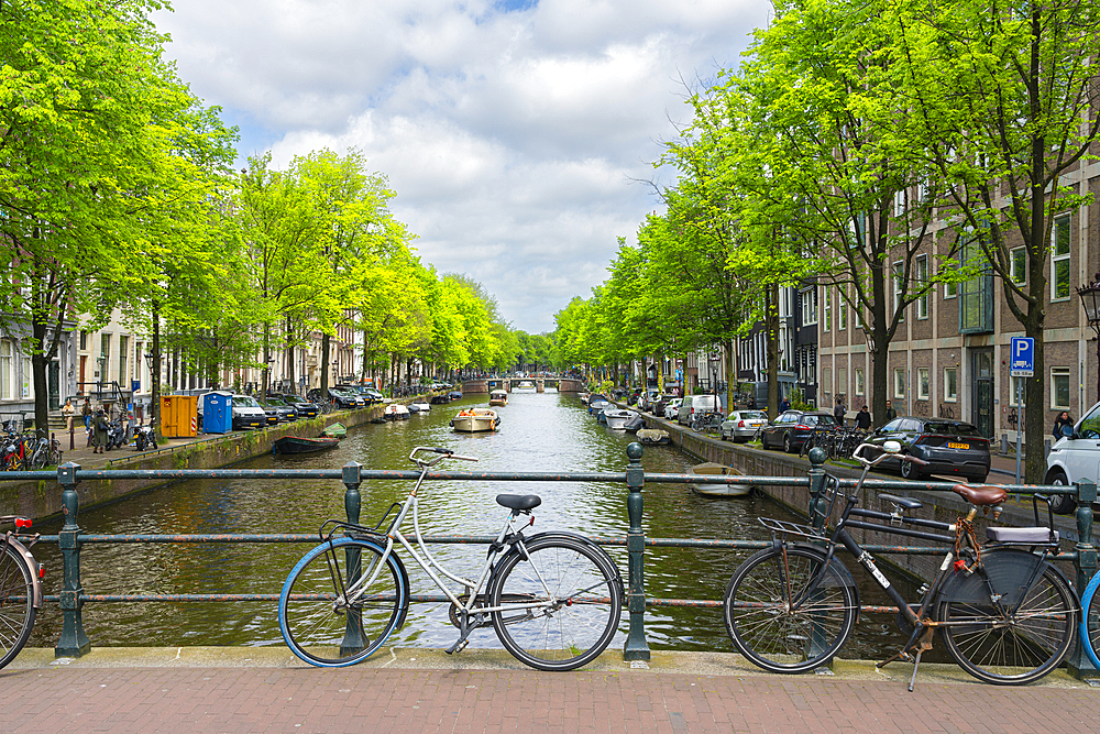 Bicycles on bridge over Herengracht canal, Amsterdam, The Netherlands, Europe