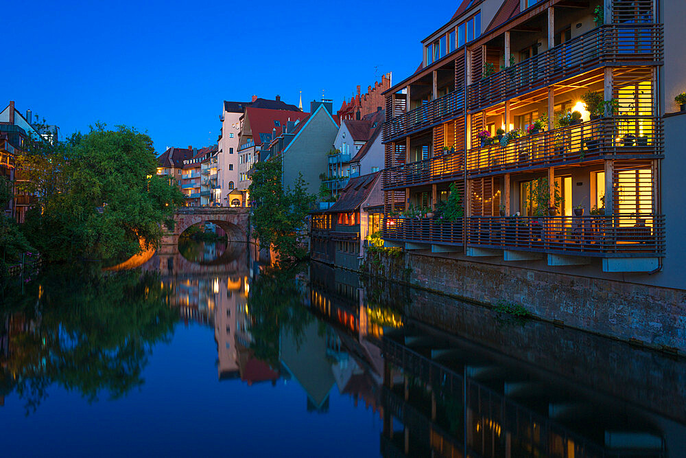 Residential buildings along Pegnitz River seen from Henkersteg bridge, Nuremberg, Bavaria, Germany, Europe