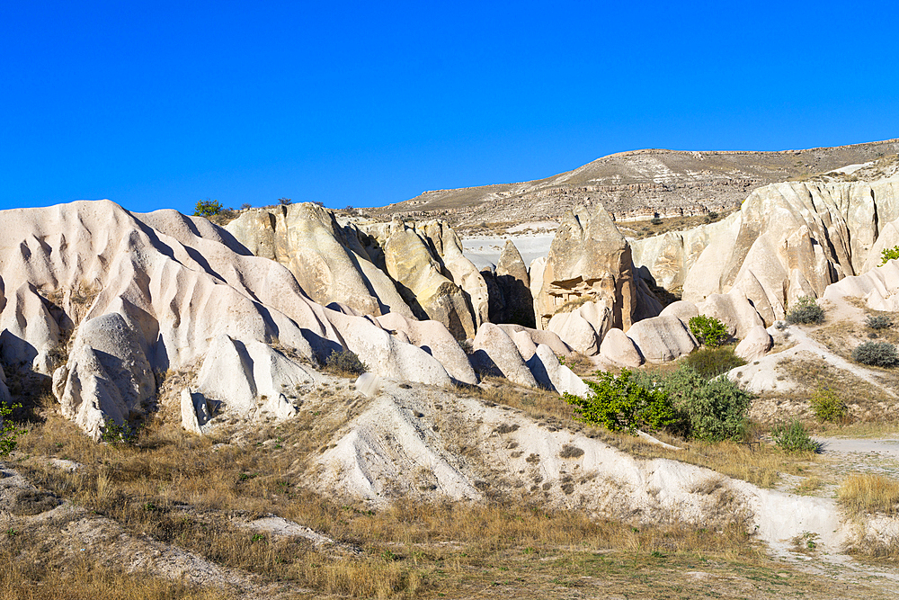 Rock formations of Red Valley (Rose Valley), Cavusin, Cappadocia, Anatolia, Turkey, Asia Minor, Asia