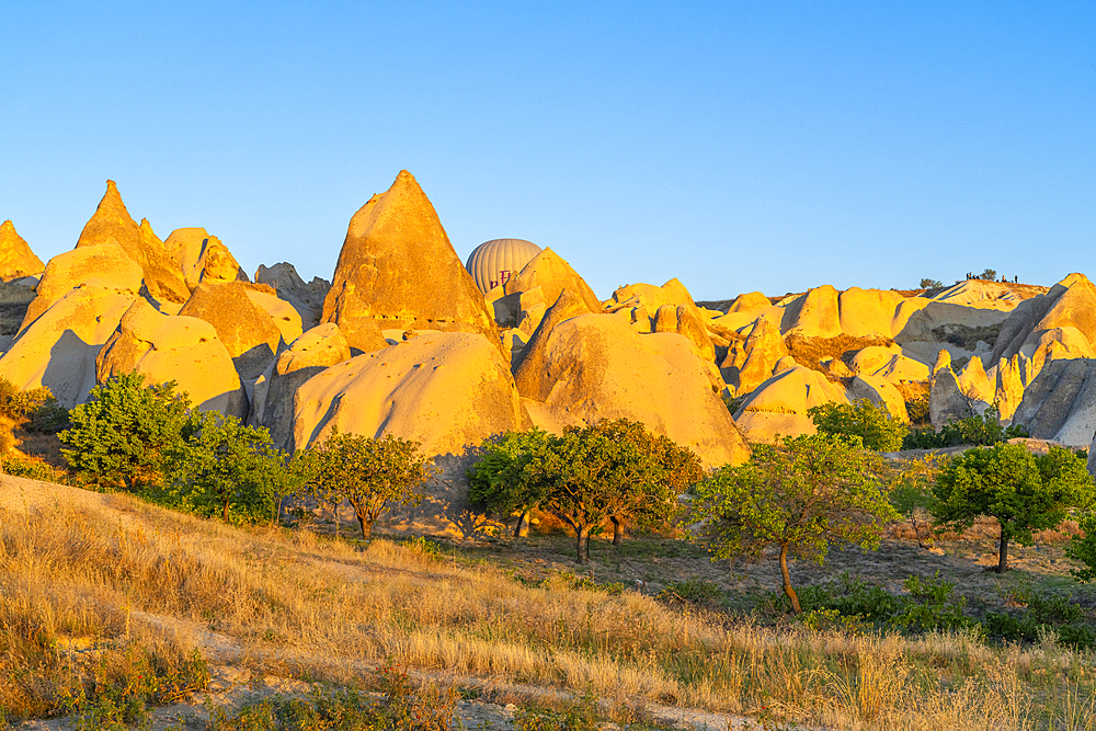 Aerial view of rock formations at sunrise, Goreme, Goreme Historical National Park, UNESCO World Heritage Site, Cappadocia, Central Anatolia Region, Anatolia, Turkey, Asia Minor, Asia