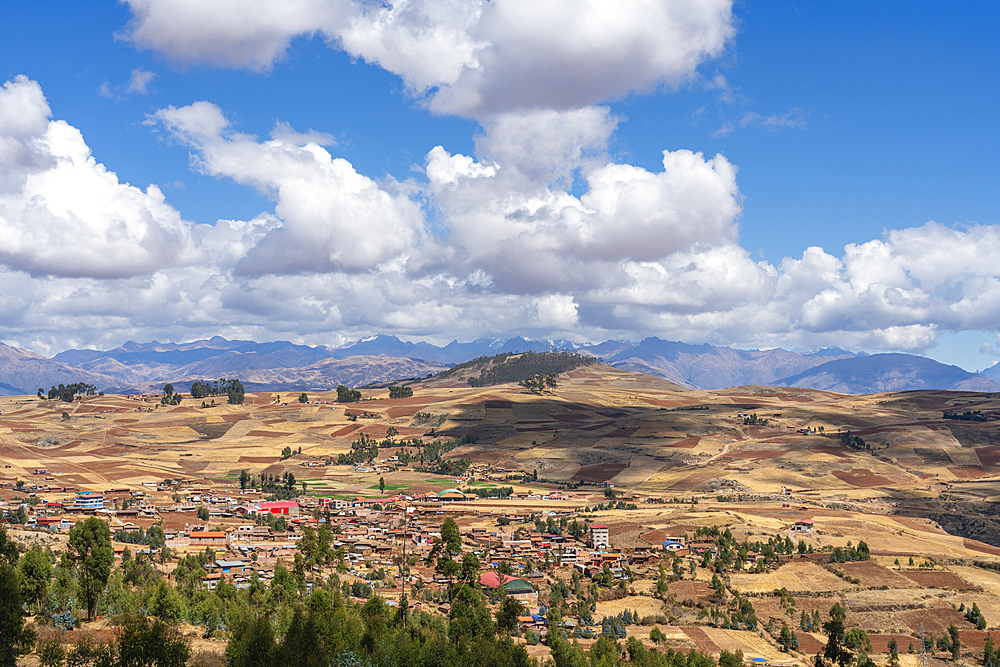 Racchi village near Chinchero with distant views of Andes mountains, Sacred Valley, Peru, South America