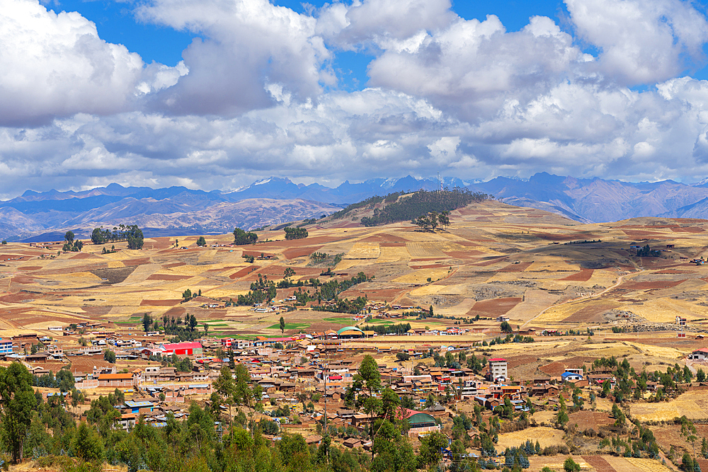 Racchi village near Chinchero with distant views of Andes mountains, Sacred Valley, Peru, South America