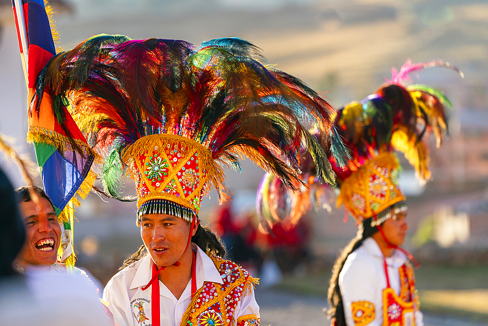 Peruvian men in with traditional headwear on celebration, Chinchero, Peru, South America