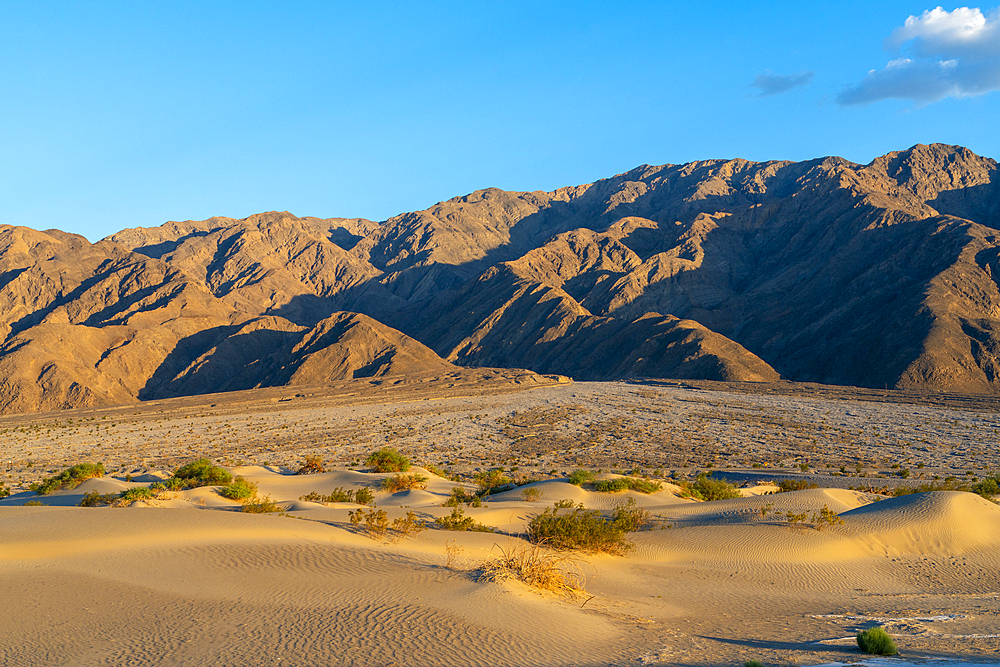 Mesquite Flat Sand Dunes and rocky mountains in desert, Death Valley National Park, Eastern California, California, United States of America, North America