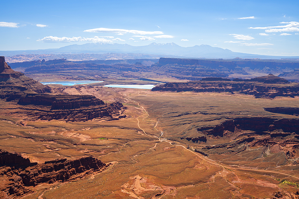 Distant view of potash ponds in canyon country, Dead Horse Point, Dead Horse Point State Park, Utah, United States of America, North America