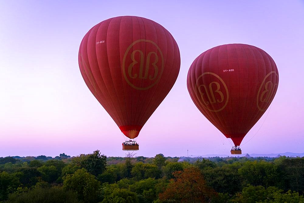 Two hot-air balloons at dawn over Bagan, UNESCO, Bagan, Myanmar