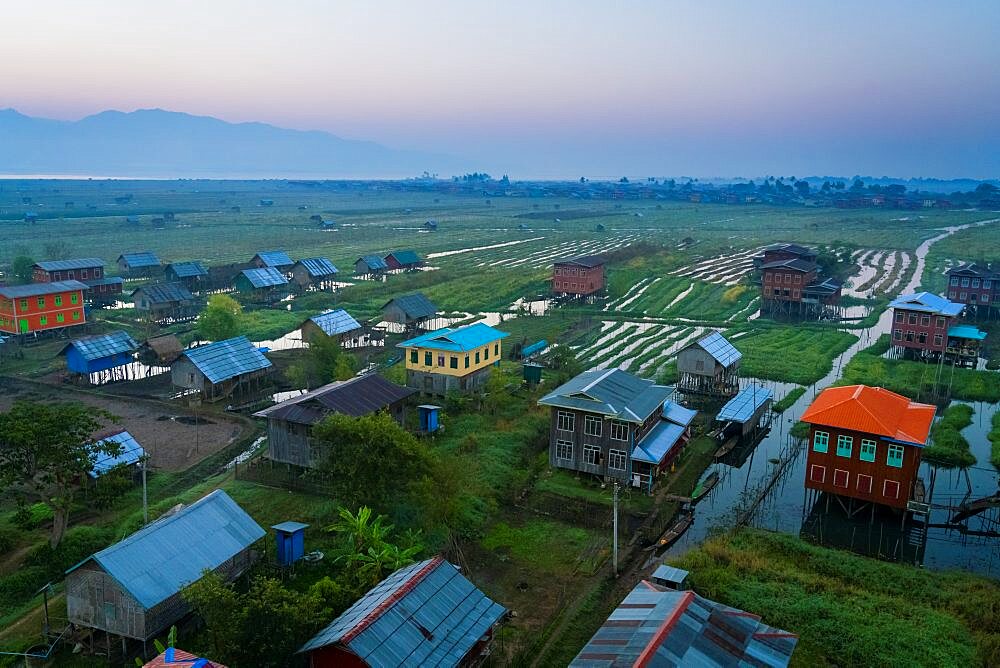 Aerial view of village and floating gardens before sunrise, Lake Inle, Myanmar