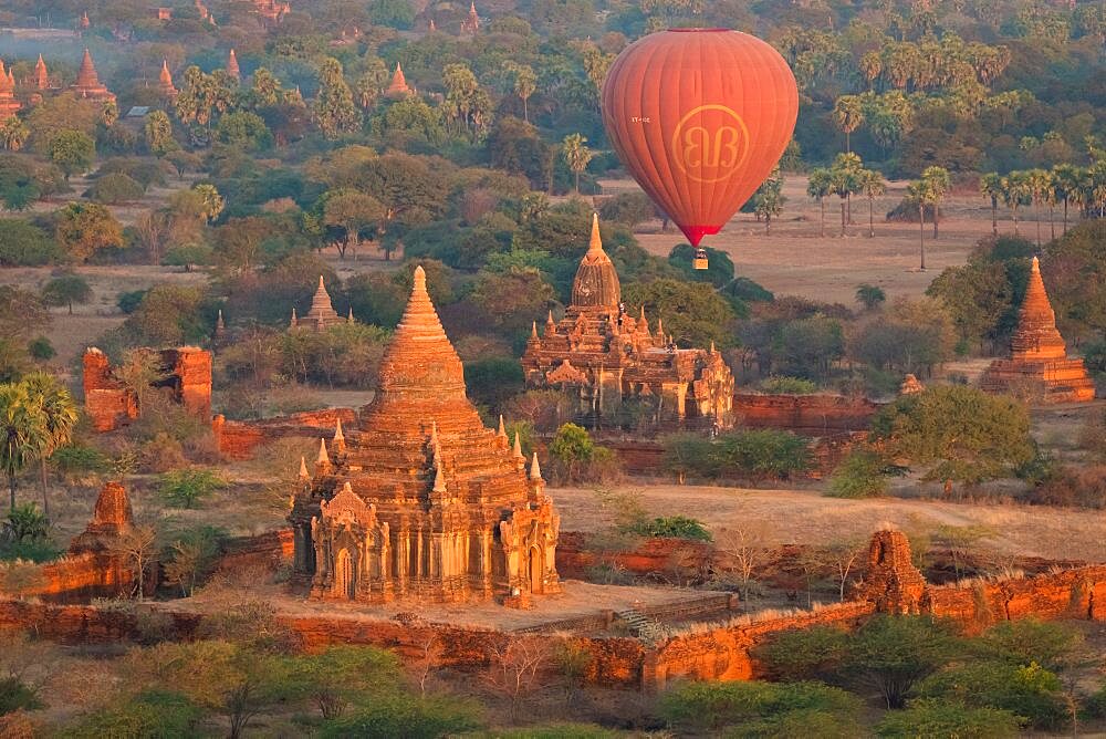 Old temple in Bagan and hot-air balloons before sunrise, UNESCO, Old Bagan, Myanmar