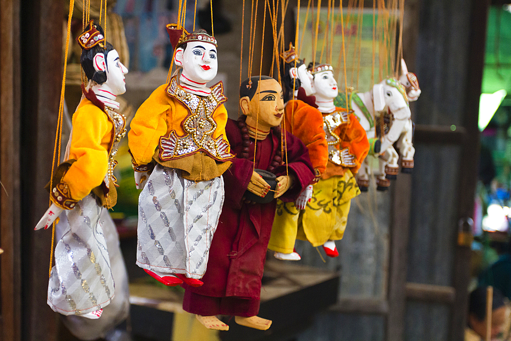 Close-up of Burmese puppet (Yoke the) (marionettes) hanging from strings on market, Nyaungshwe, Lake Inle, Shan State, Myanmar (Burma), Asia