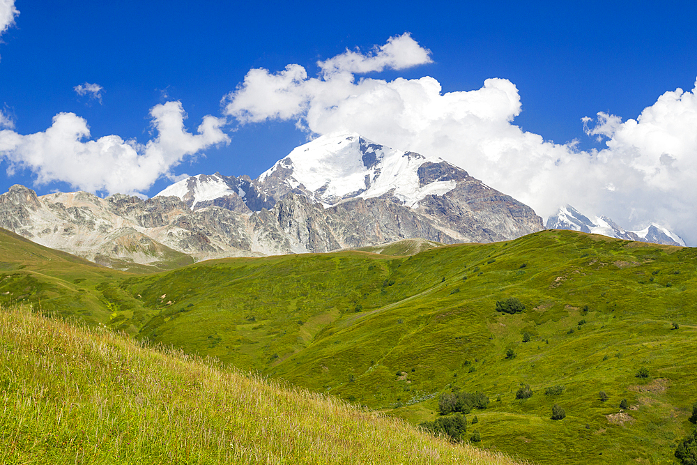 Peak of Svaneti mountains and meadow near Adishi, Georgia, Central Asia, Asia