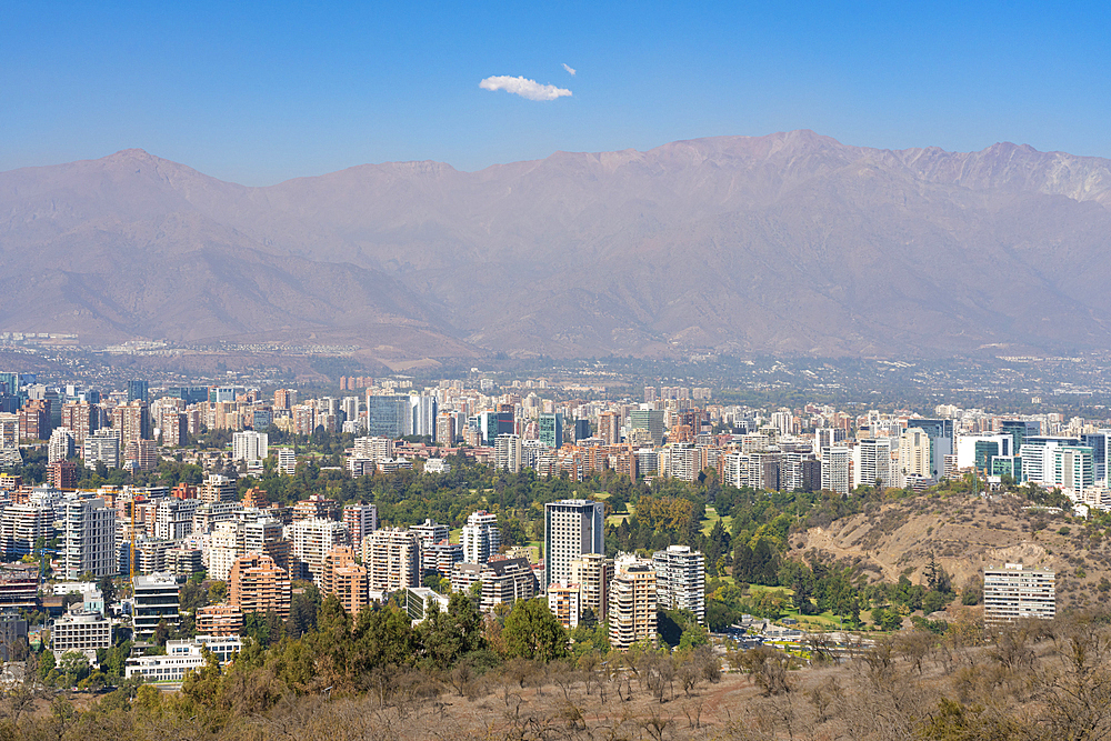 Vitacura and El Golf neighborhoods seen from San Cristobal Hill (Metropolitan Park) with Andes in background, Santiago Metropolitan Region, Chile, South America