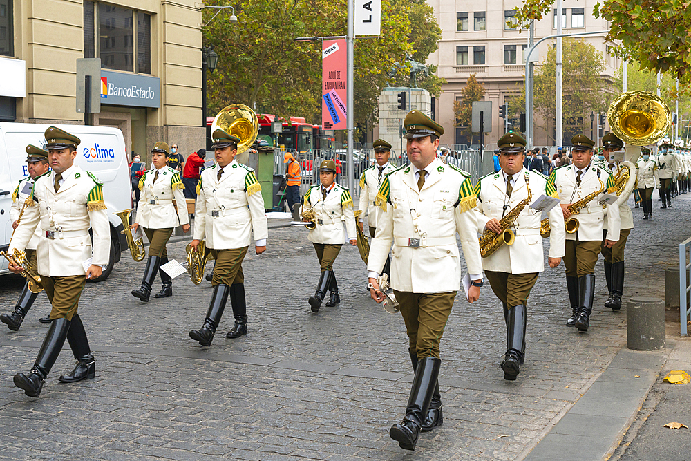 Policemen marching to La Moneda Palace for changing of guards ceremony, Santiago, Santiago Metropolitan Region, Chile, South America