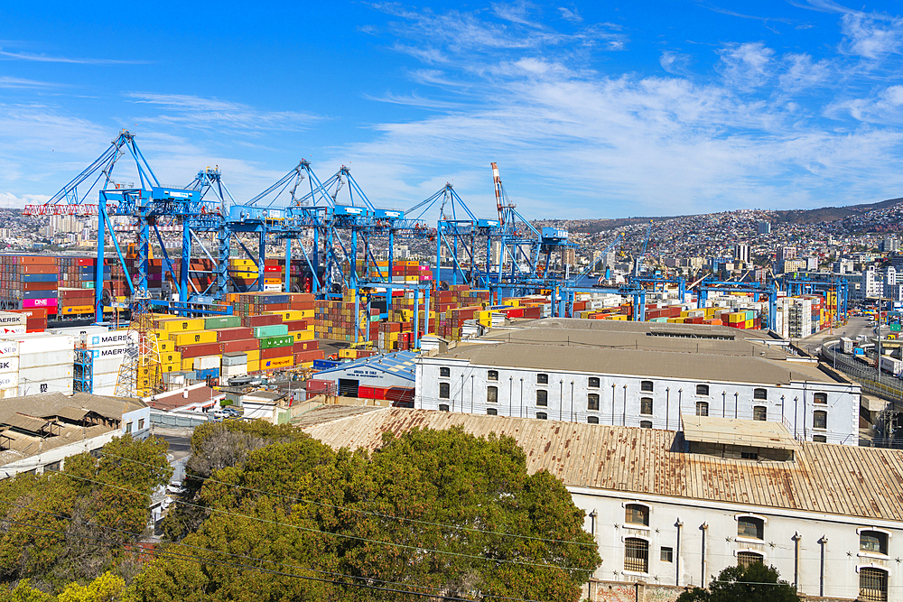 Cranes and cargo containers stacked at Port of Valparaiso, Valparaiso, Valparaiso Province, Valparaiso Region, Chile, South America