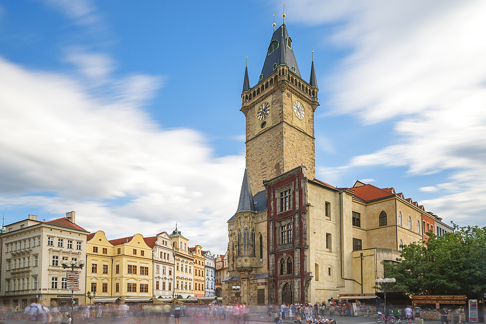 Tourists in motion at Old Town Hall Tower at Old Town Square, UNESCO World Heritage Site, Prague, Bohemia, Czech Republic (Czechia), Europe