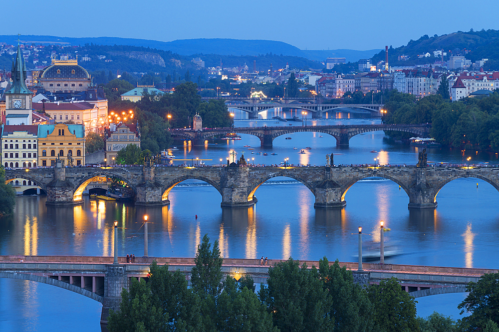 Bridges over Vltava River against sky seen from Letna park at twilight, Prague, Bohemia, Czech Republic (Czechia), Europe