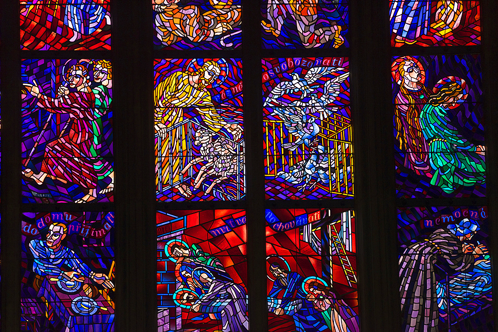 Detail of colorful stained glass window inside St. Vitus Cathedral, Prague Castle, UNESCO World Heritage Site, Prague, Bohemia, Czech Republic (Czechia), Europe