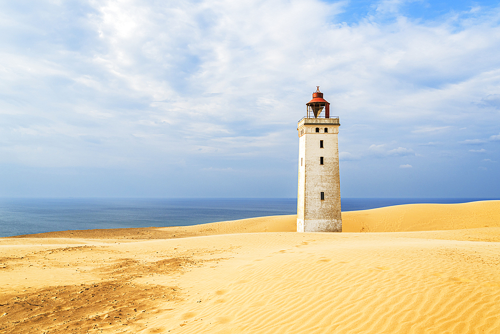 Rubjerg Knude lighthouse surrounded by sand dunes, Jutland, Denmark, Europe