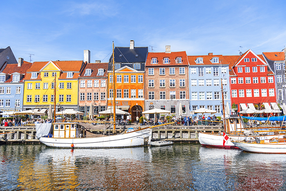 Colorful houses and moored boats in Nyhavn harbour, daytime, Copenhagen, Denmark, Scandinavia, Europe