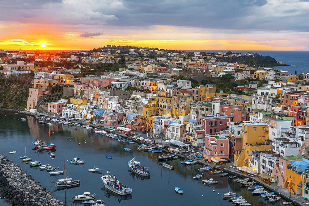 Sunset on Marina Corricella, the famous colourful fishing village on Procida island, Tyrrhenian Sea, Naples district, Naples Bay, Campania region, Italy, Europe