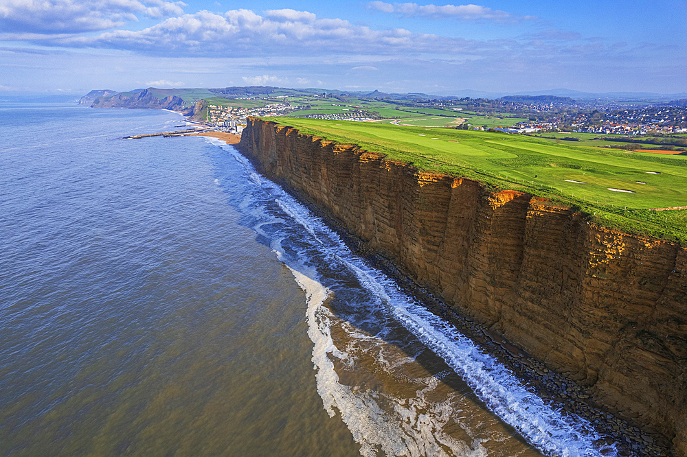 Aerial morning view of the West Bay cliffs on coastline of the Jurassic Coast, UNESCO World Heritage Site, Dorset, England, United Kingdom, Europe