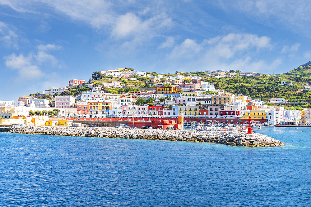 Colourful buildings surrounding the harbour of the fishing village of Ponza on a summer day, Ponza island, Pontine Islands, Latina province, Latium (Lazio), Italy, Europe