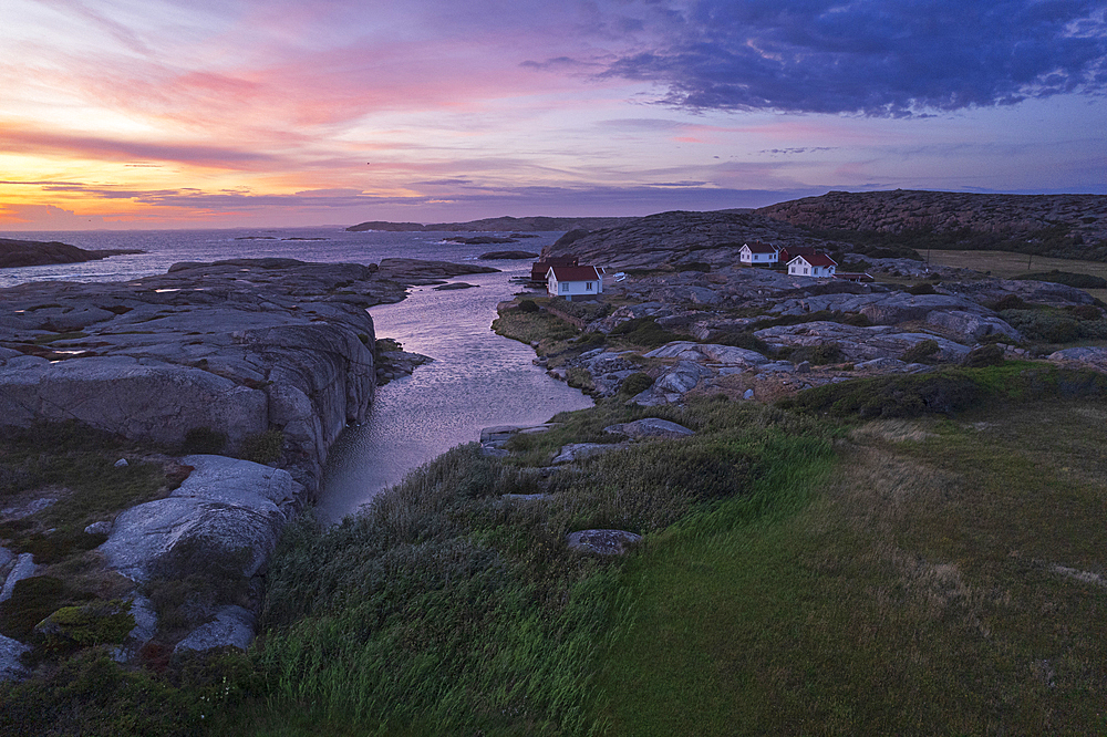 Dusk time on Ramsvik island with isolated houses on granite rocks facing the ocean, Bohuslan, Vastra Gotaland, West Sweden, Sweden, Scandinavia, Europe