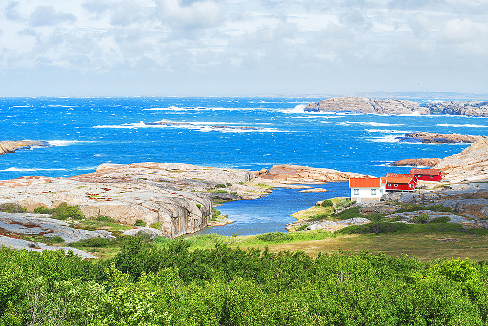 Isolated cottages on granite rocks by the sea, Bohuslan region, Vastra Gotaland, Sweden, Scandinavia, Europe