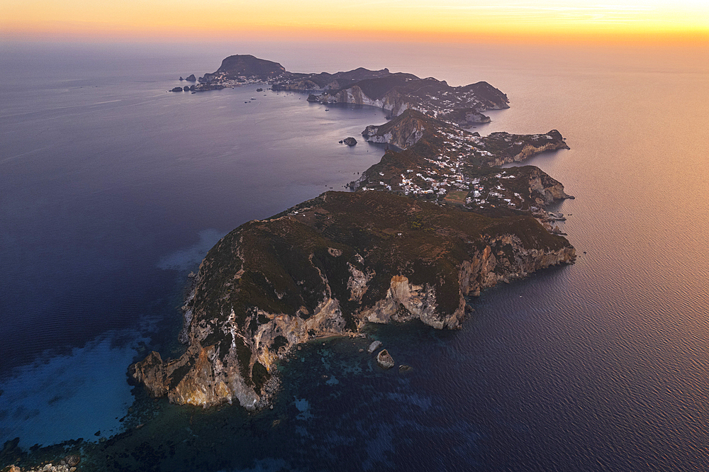 Aerial view of the island of Ponza with typical moon shape at dusk, Pontine archipelago, Latina province, Tyrrhenian Sea, Latium (Lazio), Italy Europe