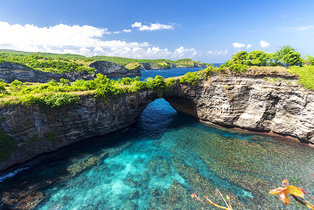 Elevated view of the tropical bay and the natural arch at the so called Broken beach, Nusa Penida, Klungkung regency, Bali, Indonesia, Southeast Asia, Asia