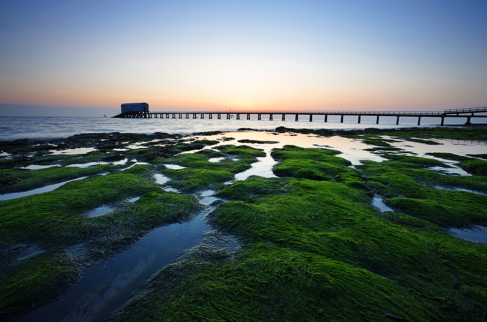 Bembridge Lifeboat Station and shoreline at dawn, Isle of Wight, England, United Kingdom, Europe