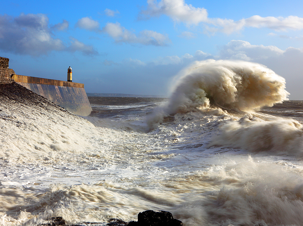 Storm waves over Porthcawl Pier, Porthcawl, South Wales, United Kingdom, Europe