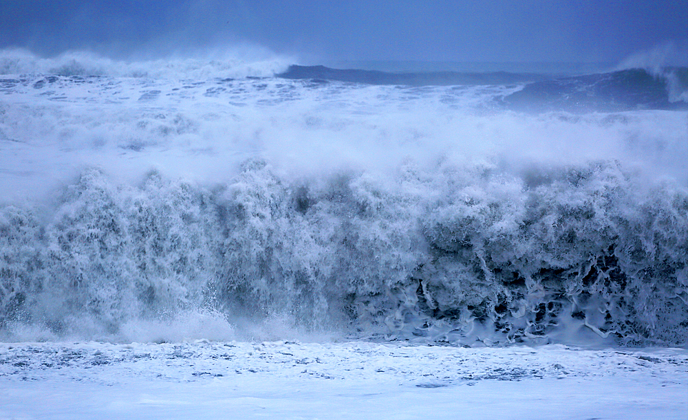 Surf at Reynisfjara black sand beach near Reynisdrangar sea stacks, near Vik, southern Iceland, Polar Regions