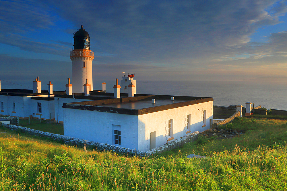 Dunnet Head Lighthouse at summer solstice sunrise, Caithness, Highlands, Scotland, United Kingdom, Europe