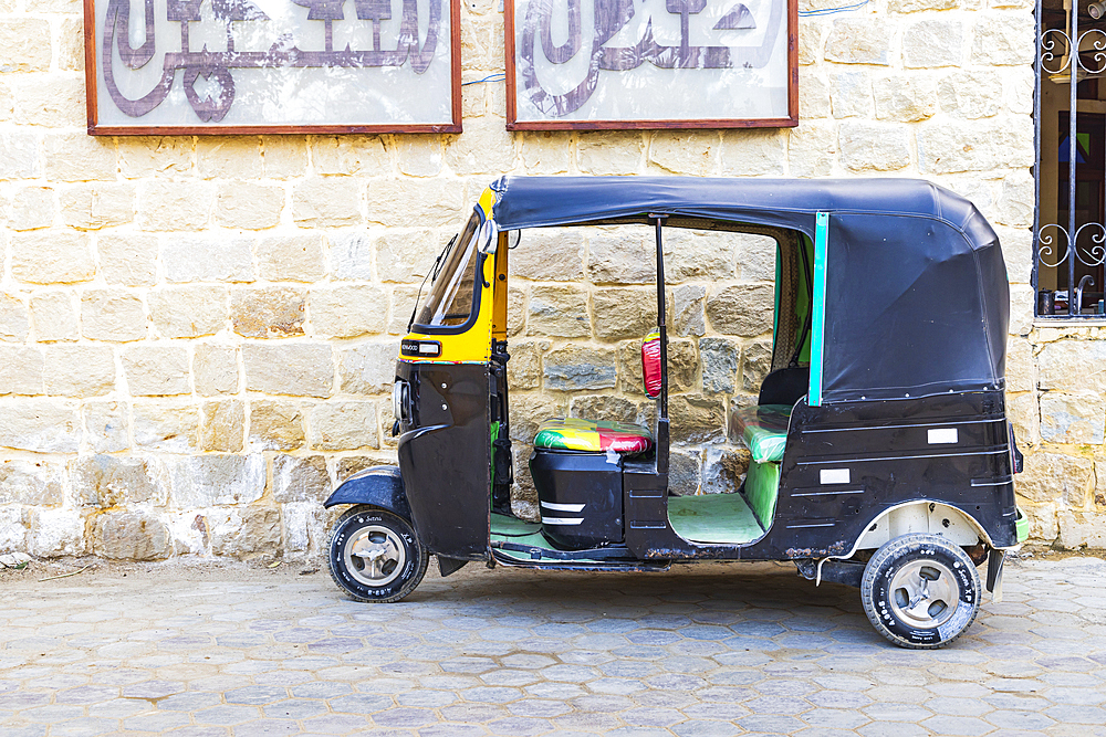 Faiyum, Egypt. February 19, 2022. Tuk tuk taxi in the village of Faiyum.