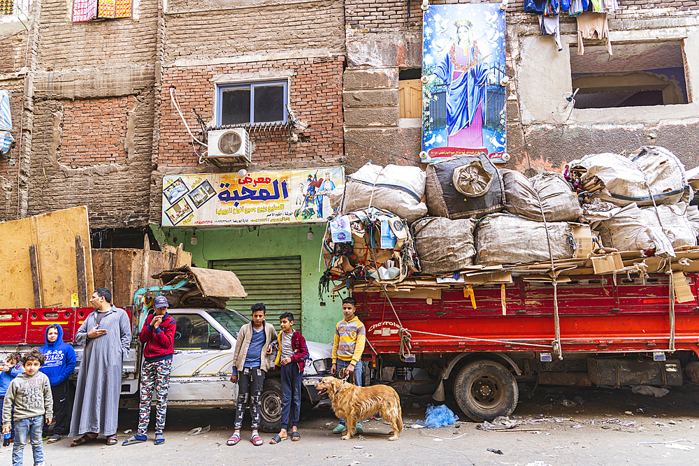 Manshiyat Naser, Garbage City, Cairo, Egypt. February 14, 2022. A truck loaded with recycled materials in Manshiyat Naser, Garbage City, Cairo.