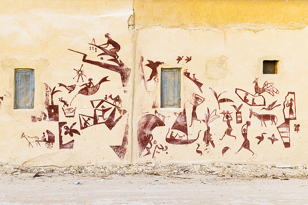 Faiyum, Egypt. February 19, 2022. Building decorated with murals in the village of Faiyum.