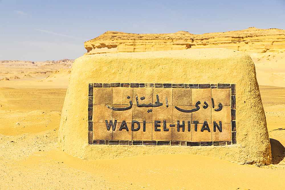 Wadi al Hitan, Faiyum, Egypt. February 20, 2022. Entrance sign at Wadi el-Hitan paleontological site.