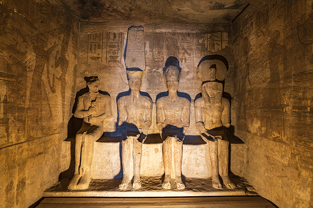 Abu Simbel, Aswan, Egypt. February 22, 2022. Statues depicting Ptah, Amun, Ramesses II, and Ra in the Holiest of Holies sanctuary in the Great Temple of Ramesses II.