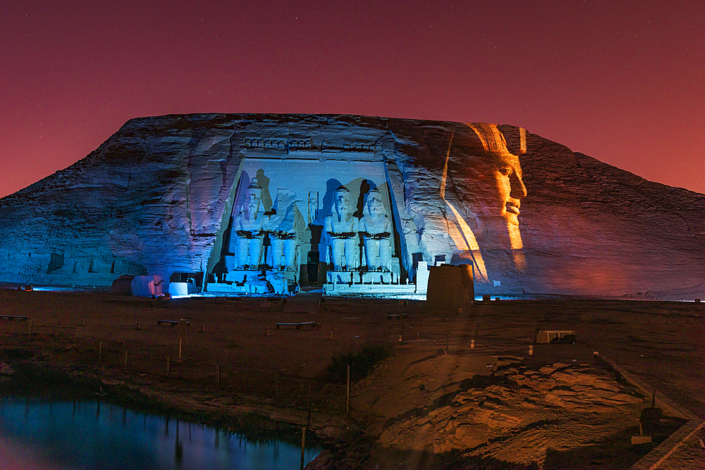 Abu Simbel, Aswan, Egypt. February 22, 2022. Night time light show projected onto the Great Temple of Ramesses II.